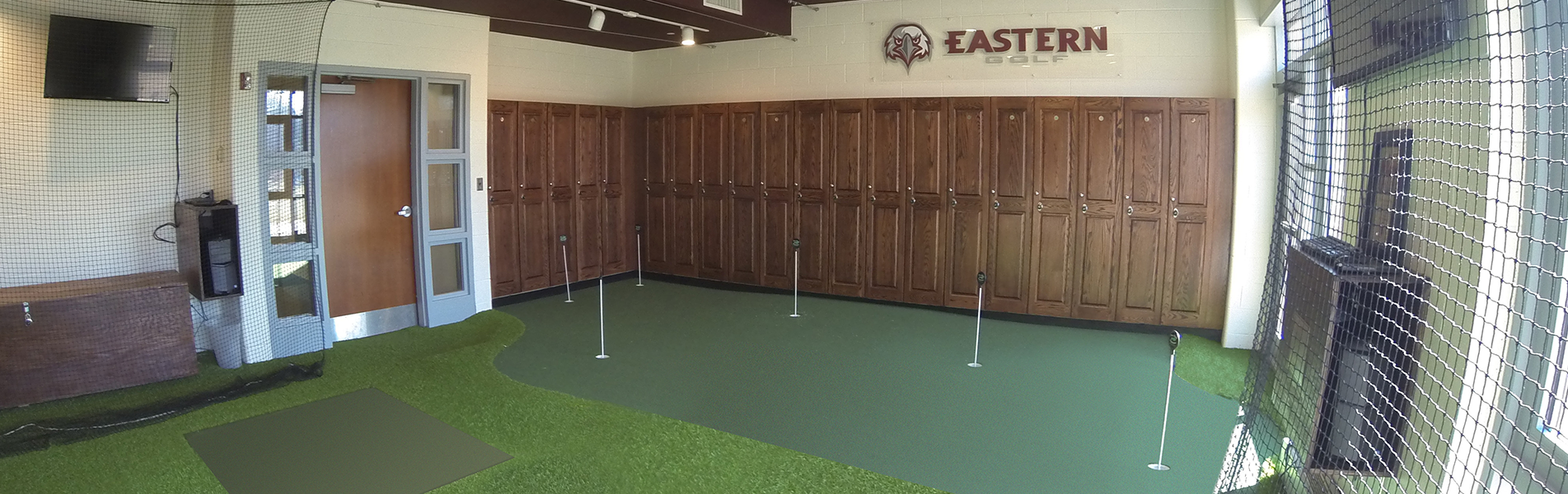 indoor college golf training facility