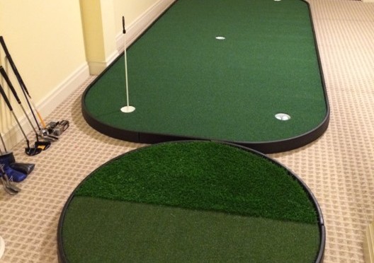 indoor golf putting green with chipping pad